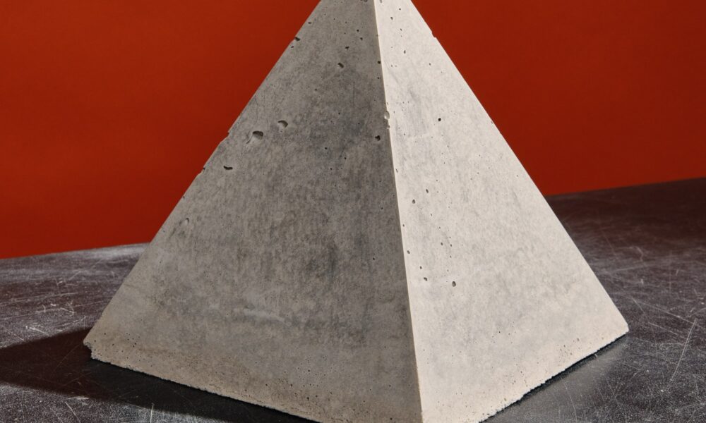 Cured cement in a pyramid shape